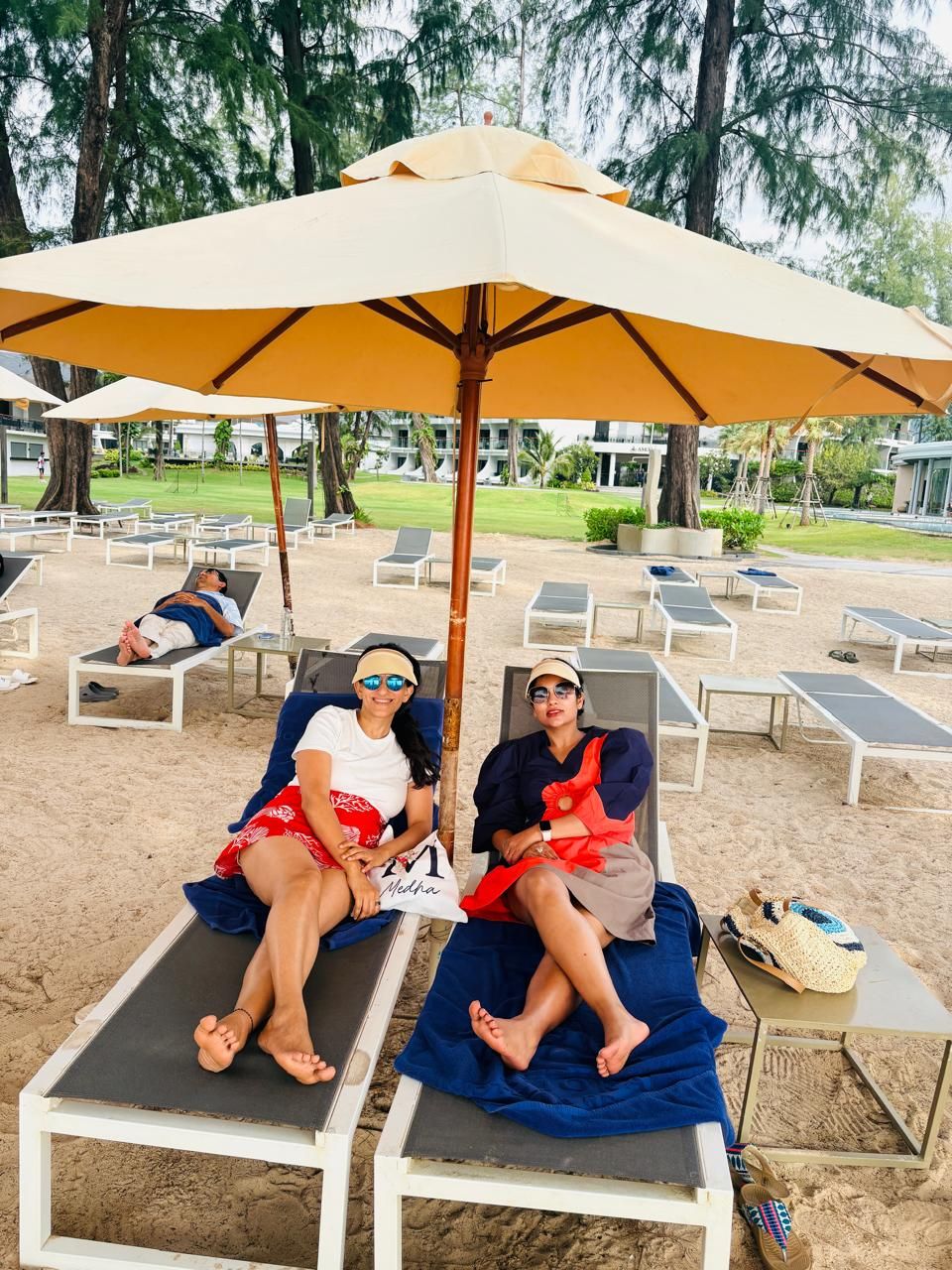 Loungers under the beach umbrellas