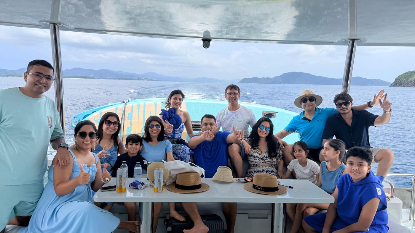 Families around the catamaran table